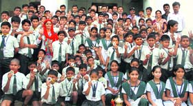 Students of Lucent International School with their medals in Dehradun on Monday.
