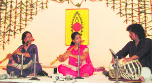 Deopriya and Suchismita accompanied by Pandit Jay Shankar Mishra on tabla give a flute recital at a programme oragnised by SpicMacay at Sardar Bhagwan Singh Institute of Bio-Medical Sciences in Dehradun on Tuesday. 