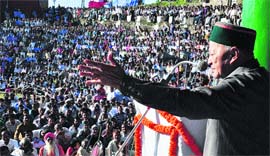 Chief Minister Virbhadra Singh addresses a public meeting at Sarahan on Tuesday.