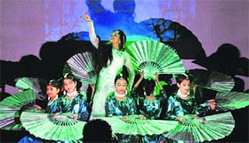Girls perform a dance during a function at the Gaiety Theatre in Shimla.