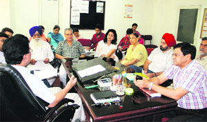 Members of the Rogi Kalyan Samiti have a meeting with the Civil Hospital authorities in Jalandhar on Tuesday. 