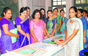 Students display their posters and collages during a 'World Ozone Day' programme held at Kanya Maha Vidyalaya in Jalandhar on Tuesday. 