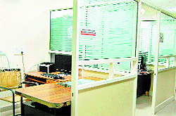 An office in Government Medical College wears a deserted look; and (below) members of the staff of government health institutions during a pen-down strike in Amritsar on Wednesday
