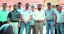 An office in Government Medical College wears a deserted look; and (below) members of the staff of government health institutions during a pen-down strike in Amritsar on Wednesday