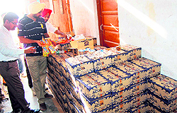 A team of the Health Department inpects soft drinks during a raid on an illegal factory at Loharka road in Amritsar on Wednesday