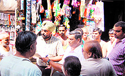 A team of the MC during a house tax recovery drive near the Durgiana Temple in Amritsar on Wednesday