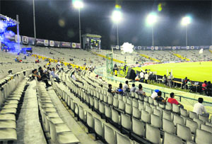 Empty chairs during a match between Otago Volts and Kandurata Maroons during the Champions League T20 at the PCA stadium, Mohali, on Wednesday.