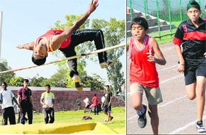 An athlete takes part in a high jump event; and (right) sprinters in action during an Athletics Meet at the Sports Complex, Sector 7, in Chandigarh on Wednesday. 