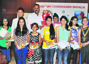 SSP Naunihal Singh with the awardees in Chandigarh on Wednesday.