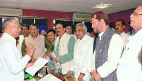BJP legislators led by Leader of Opposition Ajay Bhatt request Uttarakhand Assembly Speaker Govind Singh Kunjwal to allow discussion on the natural disaster in Dehradun on Wednesday.