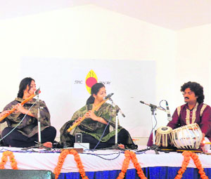 The flute sisters, Suchismita and Debopriya Chatterjee, perform at Ecole Globale International Girls School as part of SpicMacay programme on Wednesday. 