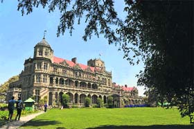 Tourists enjoy a clear sky as monsoon withdraws from the state, at the Indian Institute of Advanced Study in Shimla on Wednesday