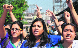 Members of the Unemployed Ayurvedic BAMS Doctors Association stage a protest in favour of their demands in Jammu on Wednesday. 