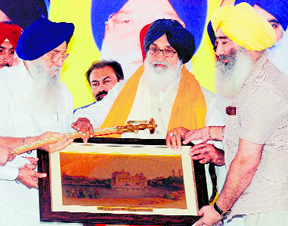Chief Minister PS Badal being felicitated at a rally in Khadoor Sahib on Wednesday.