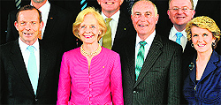 Australia's PM Tony Abbott (L) with Governor-General Quentin Bryce (2nd L), Deputy PM Warren Truss (2nd R) and Foreign Minister Julie Bishop (R) after the oath-taking ceremony in Canberra on Wednesday
