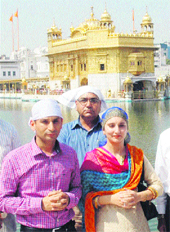 Ravi Bhagat, new Deputy Commissioner of Amritsar, along with his wife at Golden Temple in Amritsar