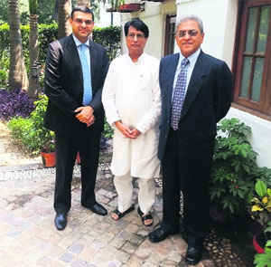 Union Minister for Civil Aviation Ajit Singh (C) with Prasad Menon (R), chairman nominee of the proposed JV and Dr Mukund Rajan, Tata Sons Director nominee of the proposed venture in New Delhi on Thursday.