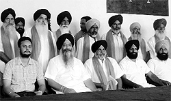 Prem Singh Chandumajra and general secretary, SAD, Bikramjit Singh, along with Congress workers who joined the party in Sirhind