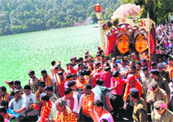 The idols of Nanda and Sunanda being taken for immersion in the Naini lake in Nainital on Thursday on the conclusion of the Nanda Devi festival. Photo: Kamal Jagati 
