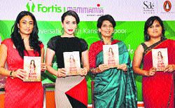 Bollywood actress Karisma Kapoor (second from left) launches her book on motherhood at Gurgaon recently. 