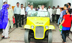 Dr RC Siwach presents a golf cart before putting it in service in BPS Government Women Medical College at Khanpur Kalan in Sonepat district. Photo: BS Malik