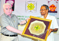 Murthal varsity Registrar RK Arora presents a memento to Prof PV Gupta during an Engineers Day programme on the university premises. Photo: BS Malik