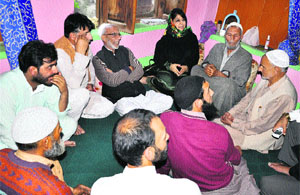 PDP president Mehbooba Mufti on Thursday consoles family members of a civilian killed in alleged CRPF firing in Shopian last week. 