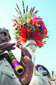 A man sells flutes during the Chhapar Mela at Mandi Ahmedgarh. 