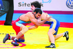 Narsingh (red) came close to winning a bronze after he got a second chance through repachage. 