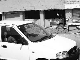 Signboards removed from a wine shop on NH-1 in Sirhind.