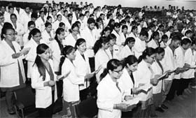 BDS students take an oath during the white coat ceremony at Panjab University, Chandigarh, on Friday.