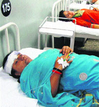 Injured passengers undergoing treatment in a hospital in Jammu on Friday.