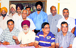 Businessmen under the aegis of the Industrial and Traders Joint Action Committee hold a meeting in Jalandhar on Friday