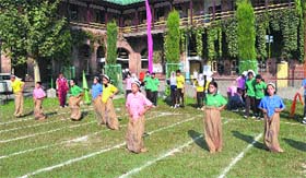 Girls participate in a race during the Annual Athletics Day celebrations at Mallinson Girls School in Srinagar on Friday.