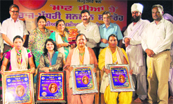 The Sarhad-e-Punjab Sports Club honours girls during an event at Virsa Vihar in Amritsar on Saturday. 