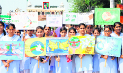 Students of Sri Guru Harkrishan Senior Secondary Public School during the International Day of Peace at the Wagah border on Saturday. 