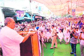 Congress legislator from Ambala Venod Sharma addresses a rally at Sadhoura in Yamunanagar district on Saturday