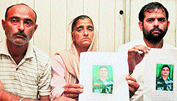 Family members of Ranjeet Kumar of 8 JAKLI address mediapersons in Jammu on Saturday