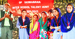Winners of the talent hunt competition with their mementoes and medals in Mahore on Saturday