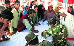 Patients being examined at a medical camp at Ningli village in Baramulla on Saturday