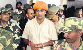 BJP MLA Sangeet Som being produced in a court in Muzaffarnagar on Saturday.