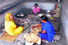 Mid-day meal cooks are protesting against the hiring of a firm to cook and serve food to children in government schools of the state