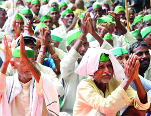 Activists of the Bharatiya Kisan Union stage a dharna for their demands at Jantar Mantar in New Delhi on Sunday. 