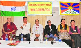 President of the National Security Forum and former Union Minister Vikram Mahajan with delegates of the Tibetan Parliament at a meeting in McLeodganj on Saturday