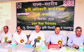 Agriculture Minister Sujan Singh Pathania speaks during a state-level agriculture officers workshop at HP Agriculture University in Palampur on Saturday