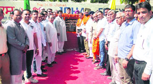 Chief Parliamentary Secretary Som Parkash and Markfed chairman JS Wahid lay the foundation stone of a footpath in Phagwara.