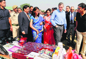 Chief Minister Omar Abdullah looks at items displayed at the Police Public Mela at Bakshi Stadium in Srinagar on Sunday.
