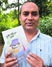 Writer Ajmer Sidhu with his book Khushk Akh Da Khaab in Ludhiana on Sunday.