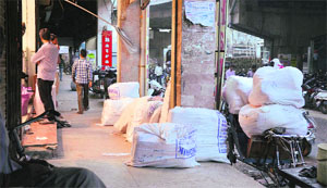 sacks lying on a footpath at Bhadaur House in Ludhiana