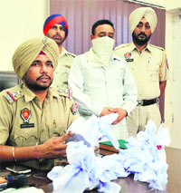 One of the accused in police custody in Ludhiana. 